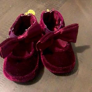 Stuart Weitzman Baby Crib shoes in Maroon.